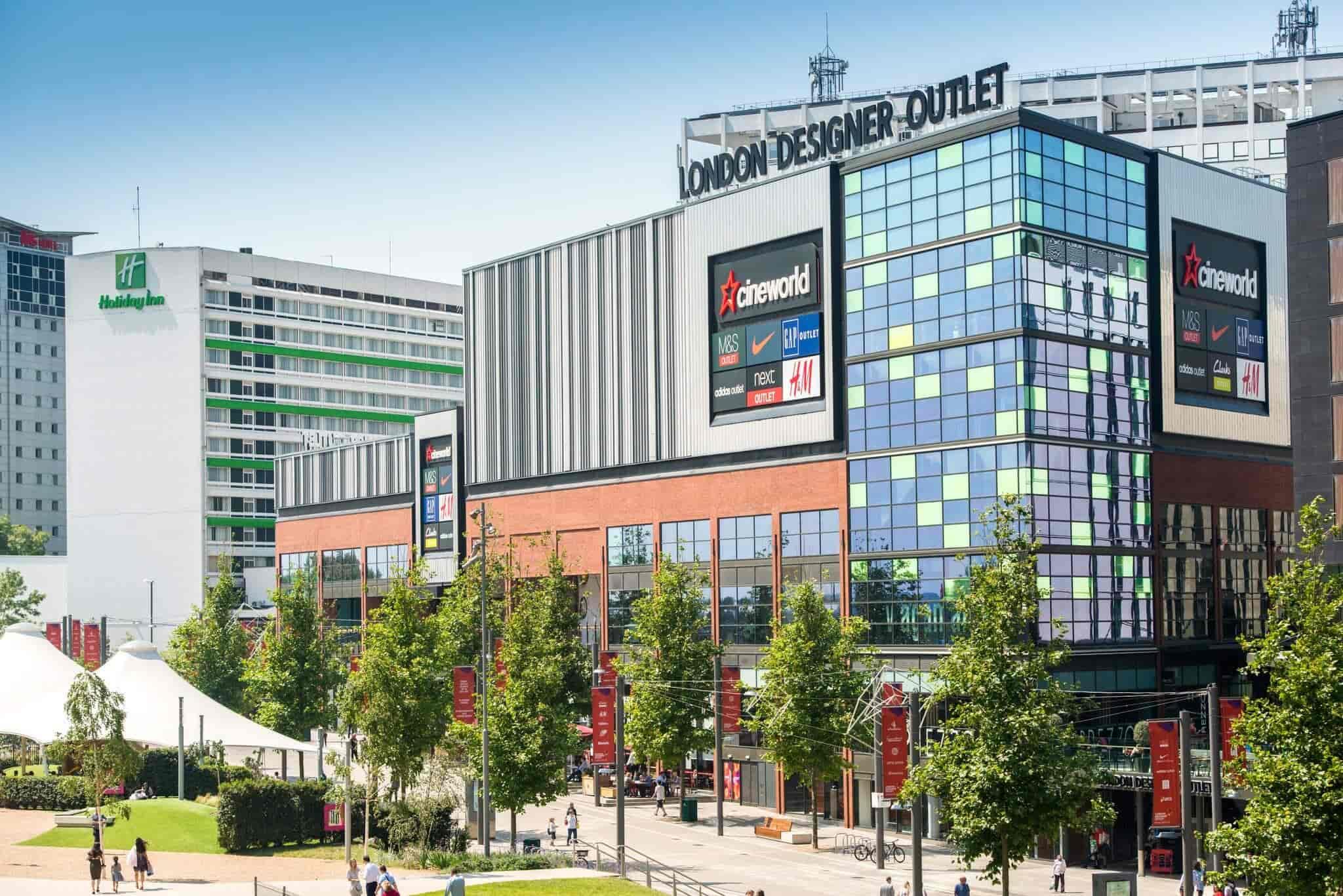 The Wembley Park Gardens in London, is a bustling hub with a multitude of people walking around