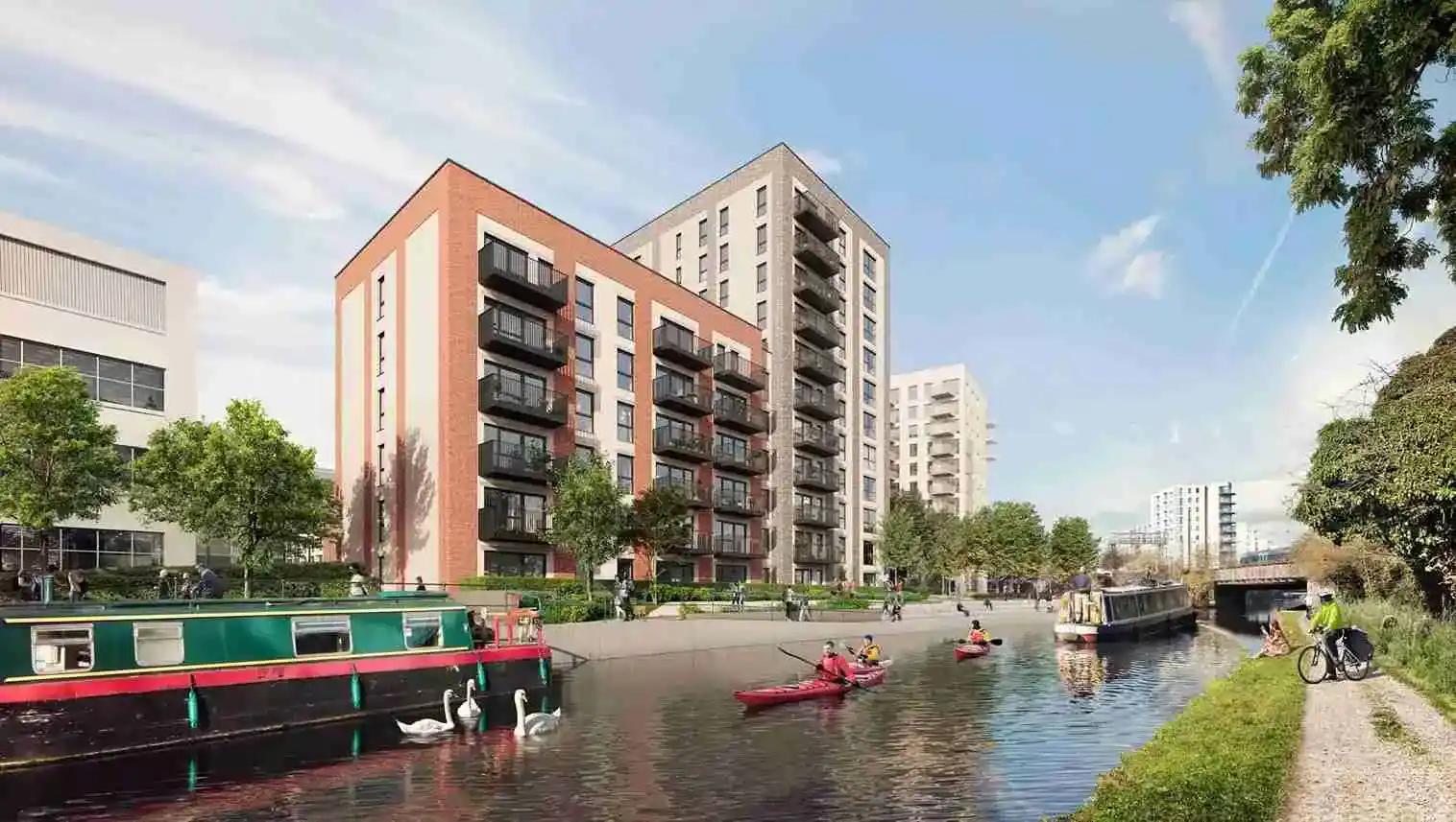 Hayes Village Homes, featuring a picturesque canal with boats gracefully cruising along its waters.