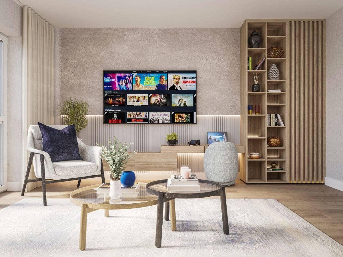 A living room with a tv on the wall located in the Springfield Place Development in London